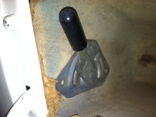Lever inside glove box